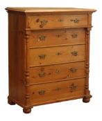 Early 20th century pitch pine chest with one frieze above four long graduating drawers enclosed by