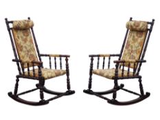 Pair stained beech American rocking armchairs, ring turned frames upholstered in floral fabric,