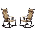 Pair stained beech American rocking armchairs, ring turned frames upholstered in floral fabric,