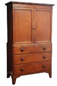 Early 19th century oak press cupboard with two moulded panelled doors and fitted slides above three