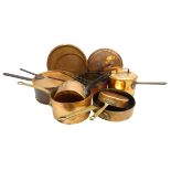 Victorian and later copper cooking pans, including a set of three graduating pans,