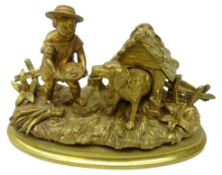 19th century gilt bronze ink stand in the form of a child feeding a dog,