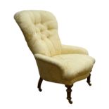 Victorian style armchair with deep buttoned spoon back upholstered in cream damask,