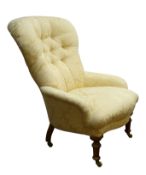 Victorian style armchair with deep buttoned spoon back upholstered in cream damask,
