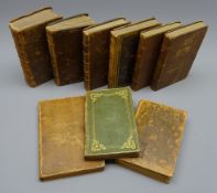 Nine 18th/early19th century full leather bound books including L'Iliade D'Homere. 1711.