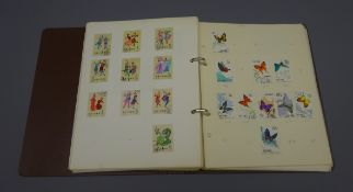 Collection of Chinese mint and used stamps 1949 - 1965, all hinged on pages,