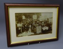 Suffragette interest - picture of a group of ladies in a garden with banners for NUWSS Kendal,