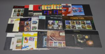 Nineteen Royal Mail presentation packs, all 1st class stamps, face value 97.