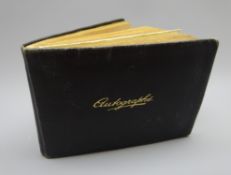 WW2 period autograph album containing signatures of entertainers and celebrities predominantly on