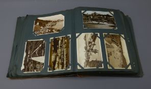 Postcard album containing over three hundred Edwardian and later postcards including real