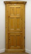 Late 19th century pine corner cupboard, two panelled doors, plinth base, W89cm,