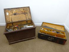 Two large wooden tool chests containing a quantity of hand tools,