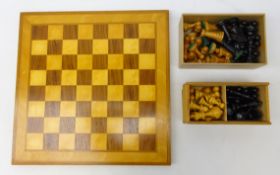 Vintage Lindop wooden chess board with boxwood chess pieces and another set of chess pieces