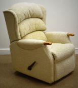 Manual reclining armchair upholstered in beige fabric,