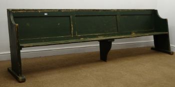 Early 20th century painted pitch pine pew, panelled back, solid end supports, sledge feet,