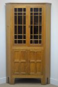 Yorkshire Oak - 'Acornman' corner cabinet, two astragal glazed doors,