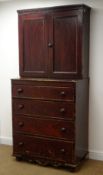Early 20th century stained pine cupboard on chest, two cupboard doors enclosing fitted shelves,