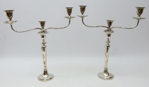Pair 19th century Sheffield plated candelabra, twin scroll branch, leaf moulded top on tapered stem,