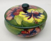 Moorcroft Hibiscus powder jar and cover on green ground,