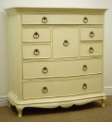 Wallis & Gambier Ivory serpentine chest, moulded top, eight drawers, shaped apron,