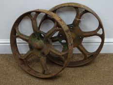 Pair of cast iron spoked wheels,