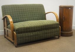 Art Deco beech framed two seat sofa, upholstered in a patterned green material (W117cm,