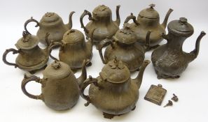 Nine Victorian Britannia metal teapots and vintage plated hip flask