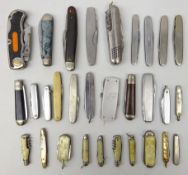 Collection of pocket knives including Premium Stock Knife, mother-of-pearl fronted fruit knives,