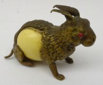 Edwardian gilt metal and Ivorine Rabbit tape measure,