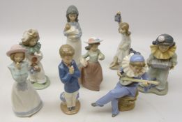 Eight Nao figures including two figures with musical instruments,