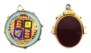 Victorian bloodstone 9ct gold swivel fob and a Victorian 1887 enamelled shilling in 9ct gold locket