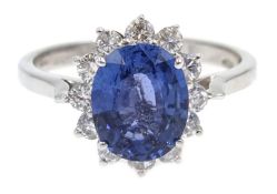 18ct white gold sapphire and diamond cluster ring, hallmarked, sapphire approx 2.