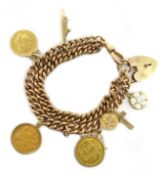 Hallmarked 9ct gold curb chain bracelet with two loose mounted half sovereigns,