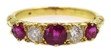 18ct gold (tested) five stone ruby and diamond ring,