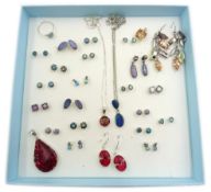 Twenty pairs of silver opal earrings,