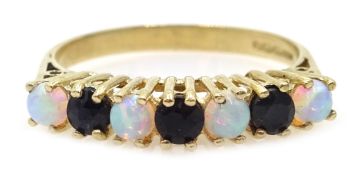 9ct gold seven stone sapphire and opal ring, hallmarked Condition Report Approx 1.