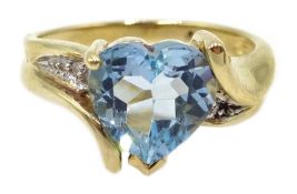 9ct gold heart shaped topaz ring, with diamond shoulders,