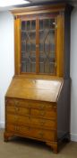 19th century oak and mahogany banded bureau bookcase, projecting cornice, dentil frieze,