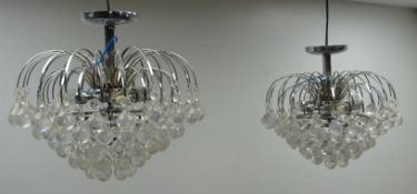 Two contemporary metal light fittings with curved branches and faceted acrylic droplets, W40cm,