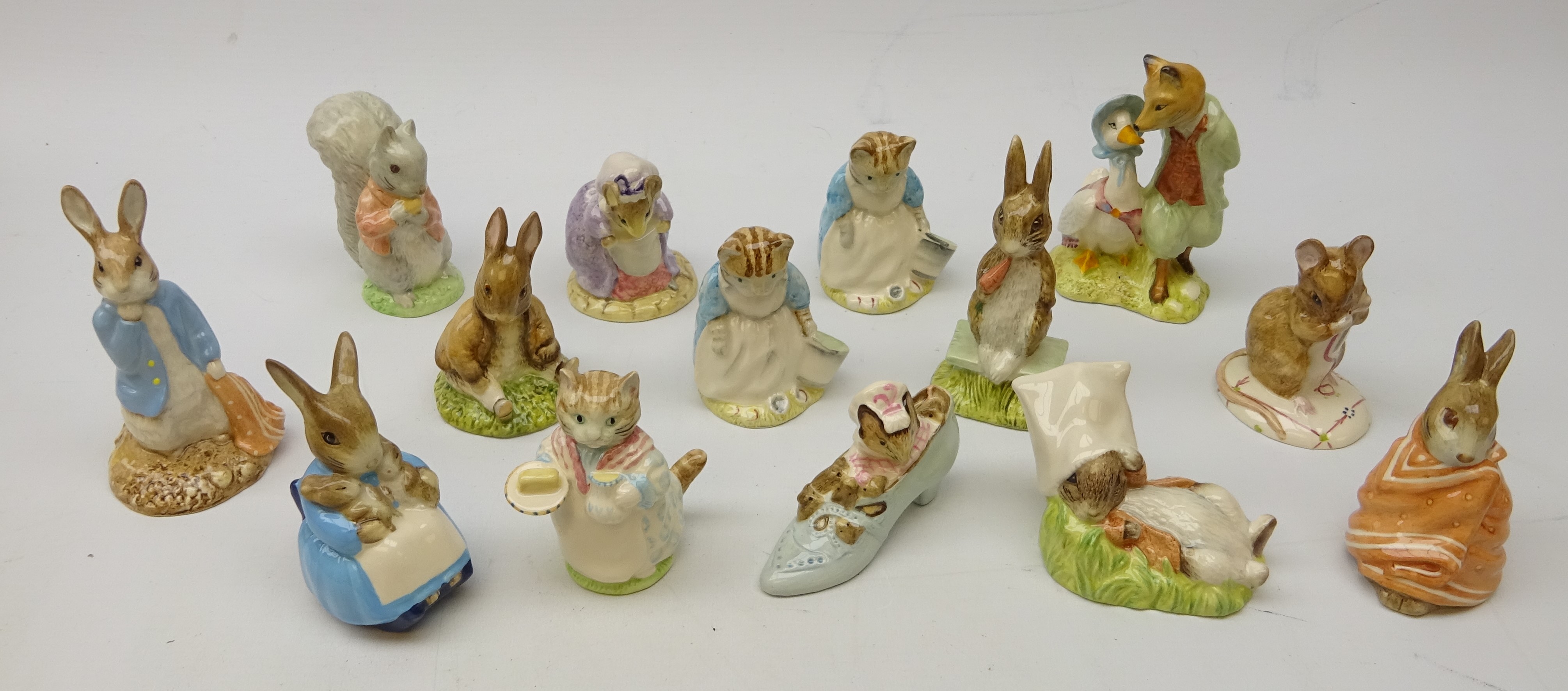 Fourteen Royal Albert Beatrix Potter figures,