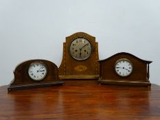 20th century inlaid oak cased mantel clock with silvered Arabic dial,