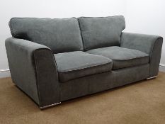 Three seat sofa upholstered in Jaynie fabric,