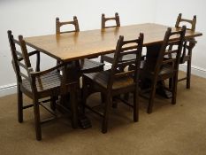 Rectangular oak refectory style dining table, solid end supports joined by single shaped stretcher,