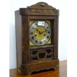 20th century oak cased mantel clock, twin train movement, striking half hours on a coil, (W25cm,