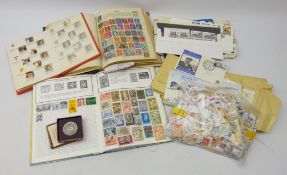Collection of Great British and World stamps in three albums and loose including some mint blocks