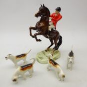 Beswick Rearing Huntsman model 868 and four Beswick Hounds (5) Condition Report