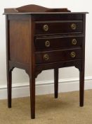 Early 20th century music cabinet, raised shaped back, moulded top, three drawers,