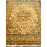 20th century Turkish carpet, green ground with geometric pattern,