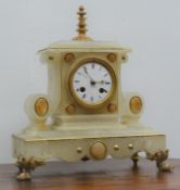 Victorian gilt metal mounted alabaster mantel clock with white Roman dial,