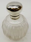 Early 20th century globular faceted glass scent bottle with silver engine turned top by Williams,